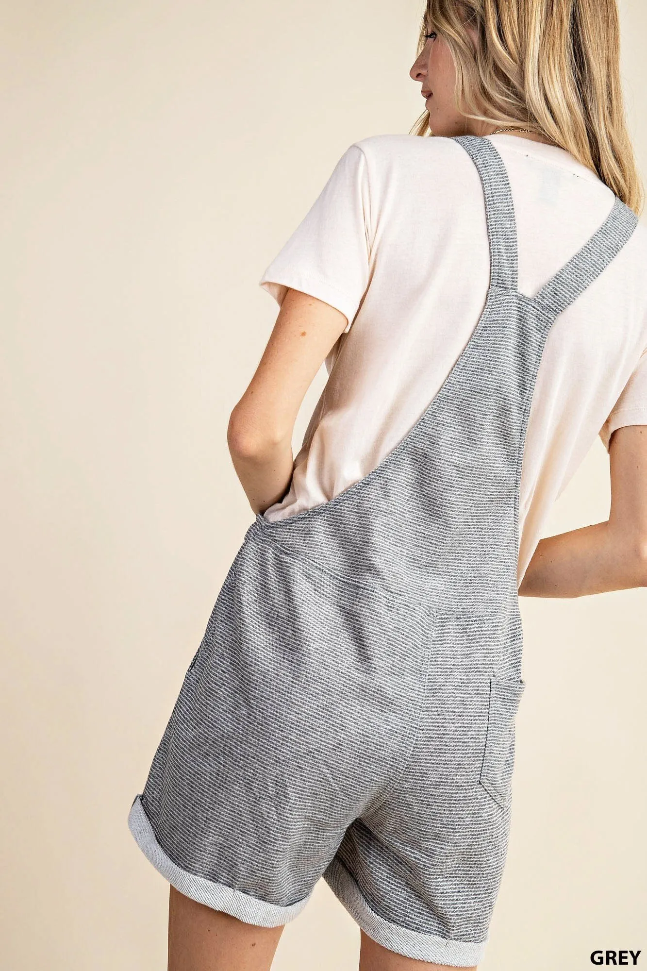 Thin striped terry overalls with pockets and waist strap